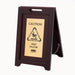 Rubbermaid 1867507 Executive Multi-Lingual Caution Sign - 2 Sided Wood/Gold-cityfoodequipment.com