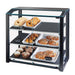Cal-Mil 3493-13S 3 Tier Pastry Display Case w/ Hinged Doors - Black Metal Frame, Acrylic-cityfoodequipment.com