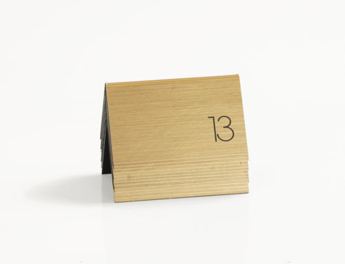 Cal-Mil 22625A-11 Tabletop Number Tents - #1-25, 5" x 3 1/2", Gold/Black-cityfoodequipment.com