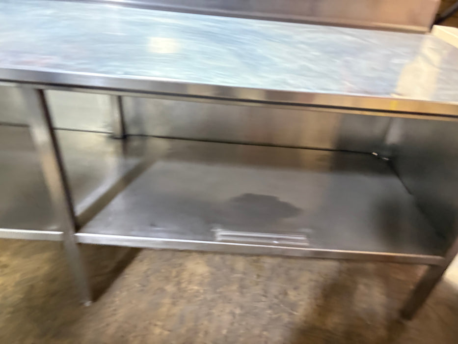 Used 96" x 30" Stainless Steel  Work Table with Closed Undershelves